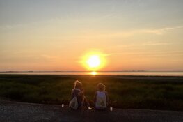 Avondwandeling met zonsondergang