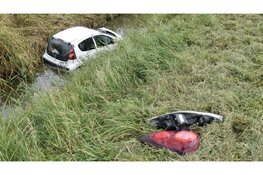 Auto te water in Wieringerwaard, bestuurder gewond